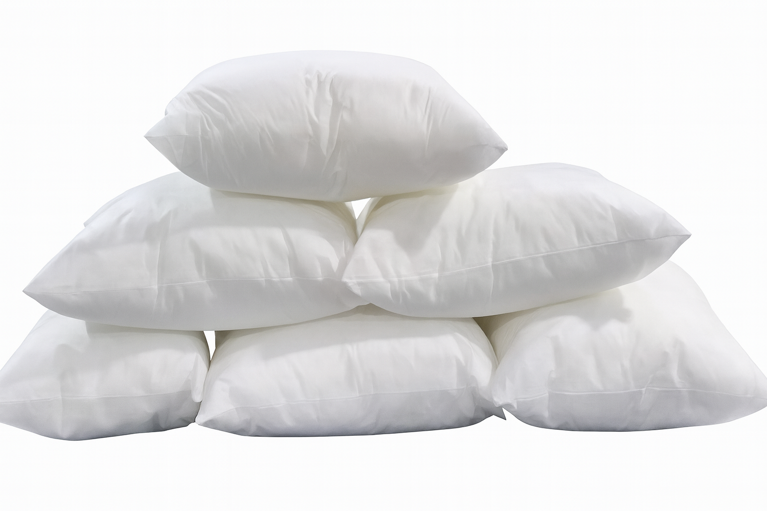 Stack of white cushion inserts.